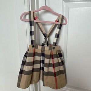 Great Burberry skirt with suspenders. Cute outfit